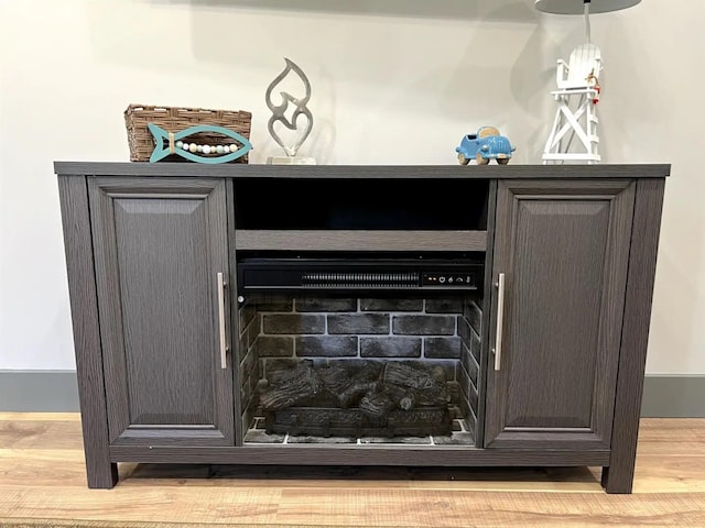 51 Yosemite Dr, Cherokee Village, AR 72529 - detailed view of wood finished floors and a fireplace