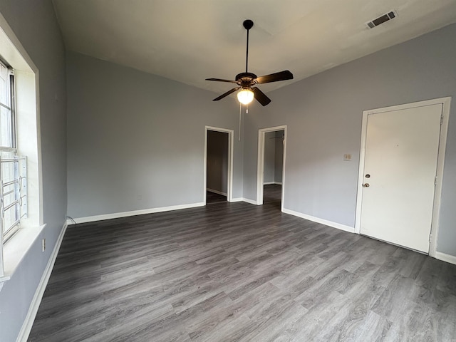 1621 Maple St, North Little Rock, AR 72114 - unfurnished room featuring wood finished floors, a ceiling fan, and baseboards