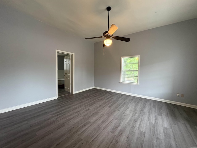 1621 Maple St, North Little Rock, AR 72114 - unfurnished room with dark wood-style flooring, baseboards, and ceiling fan