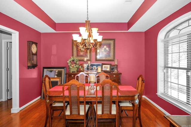 113 Deer View Cir, Hot Springs, AR 71913 - dining area with a chandelier, wood finished floors, baseboards, and a raised ceiling