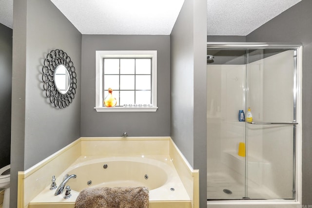 113 Deer View Cir, Hot Springs, AR 71913 - full bath with a textured ceiling, a shower stall, a tub with jets, and toilet
