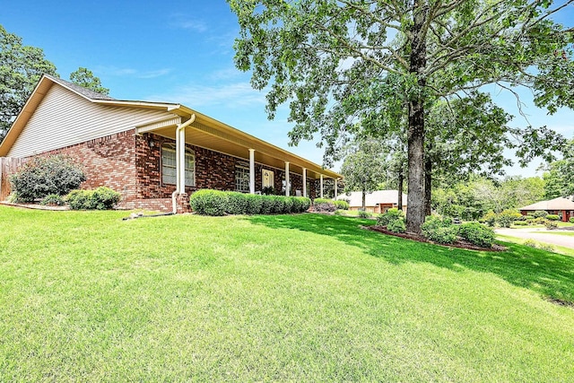 113 Deer View Cir, Hot Springs, AR 71913 - view of property exterior with a yard and brick siding