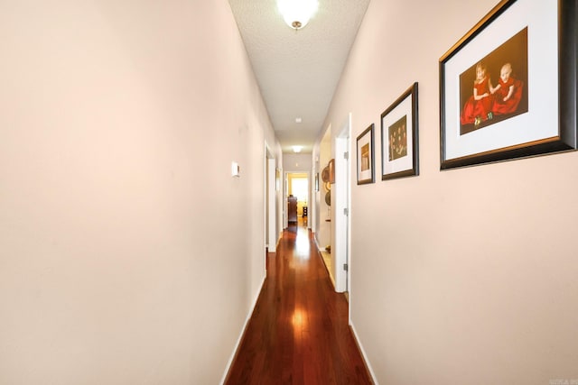 113 Deer View Cir, Hot Springs, AR 71913 - hallway featuring dark wood-style flooring, baseboards, and a textured ceiling