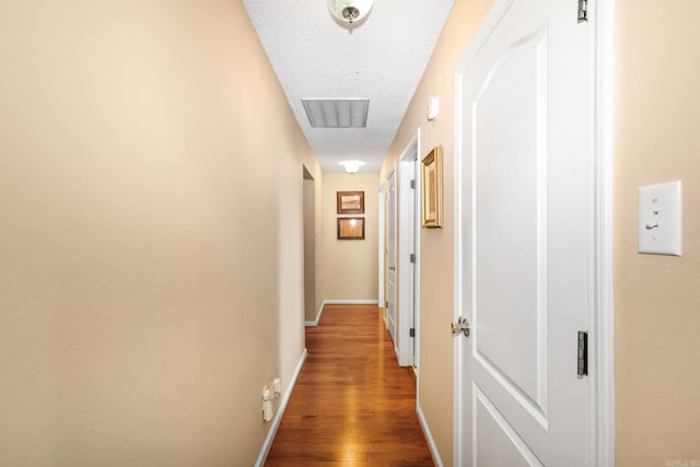 113 Deer View Cir, Hot Springs, AR 71913 - hall featuring a textured ceiling, wood finished floors, and baseboards