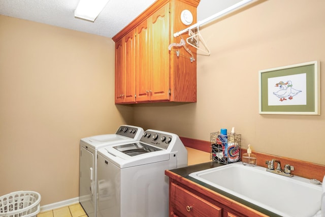 113 Deer View Cir, Hot Springs, AR 71913 - washroom featuring washer and clothes dryer, cabinet space, light tile patterned flooring, and a textured ceiling