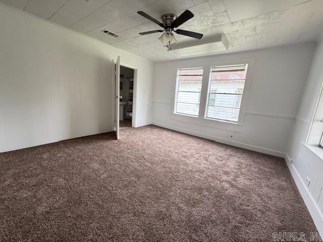 217 SE 3rd, England, AR 72046 - carpeted empty room with a ceiling fan