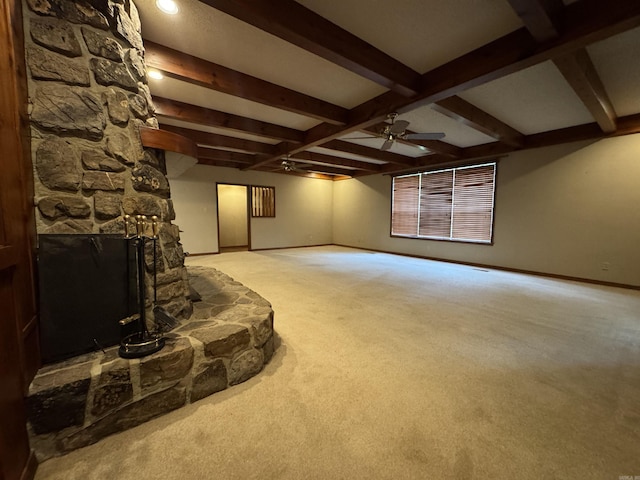 5901 Star Ln, Little Rock, AR 72223 - unfurnished living room featuring carpet, beam ceiling, baseboards, a ceiling fan, and a fireplace