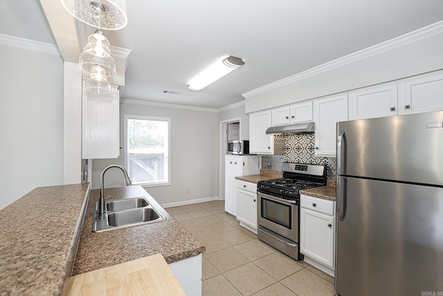 831 Jackman St, Benton, AR 72015 - kitchen with appliances with stainless steel finishes, a sink, under cabinet range hood, ornamental molding, and white cabinetry