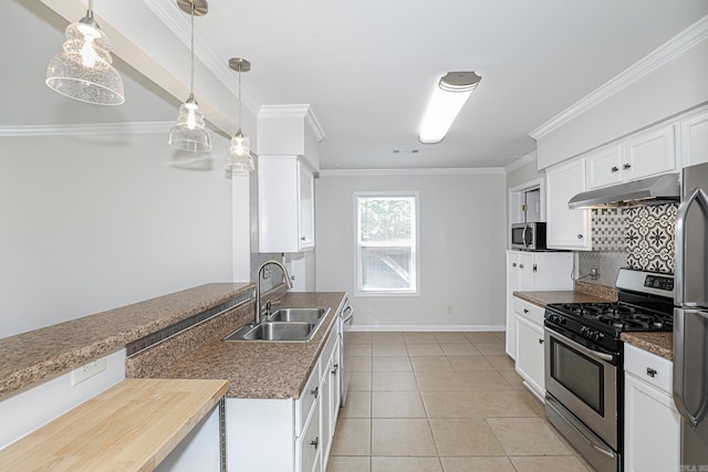 831 Jackman St, Benton, AR 72015 - kitchen featuring stainless steel appliances, under cabinet range hood, a sink, tasteful backsplash, and light tile patterned floors