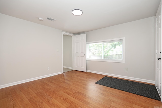831 Jackman St, Benton, AR 72015 - spare room featuring light wood-style flooring, baseboards, and a smoke detector