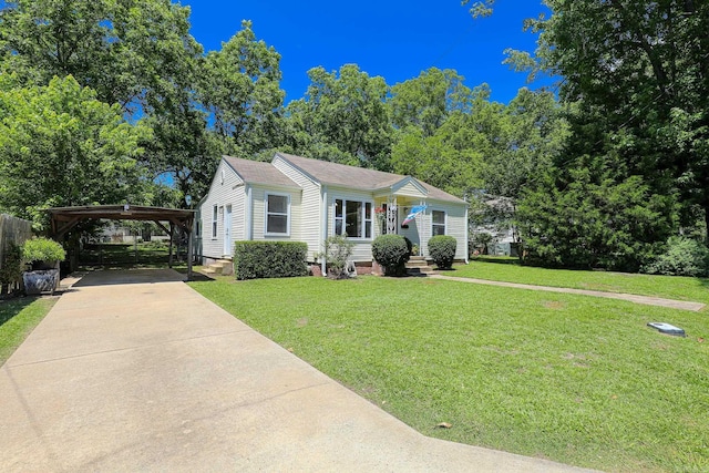 831 Jackman St, Benton, AR 72015 - view of front of house with a front lawn, concrete driveway, a detached carport, and crawl space