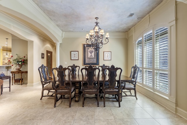 1606 Hilldale, Alexander, AR 72002 - dining room with a chandelier, light tile patterned floors, crown molding, ornate columns, and baseboards