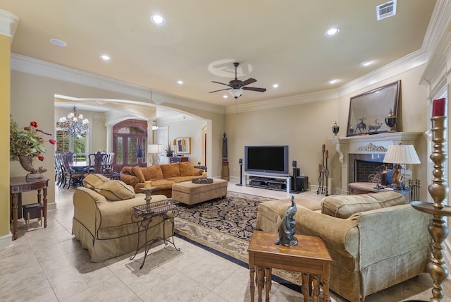 1606 Hilldale, Alexander, AR 72002 - living area with arched walkways, ornate columns, ceiling fan, a fireplace, and light tile patterned floors