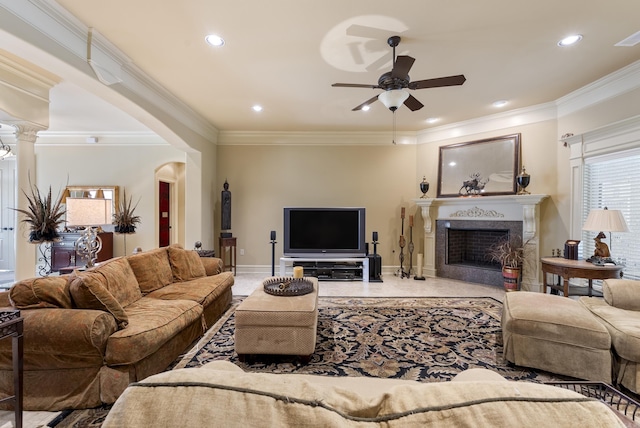 1606 Hilldale, Alexander, AR 72002 - living area featuring ceiling fan, a fireplace, crown molding, arched walkways, and recessed lighting