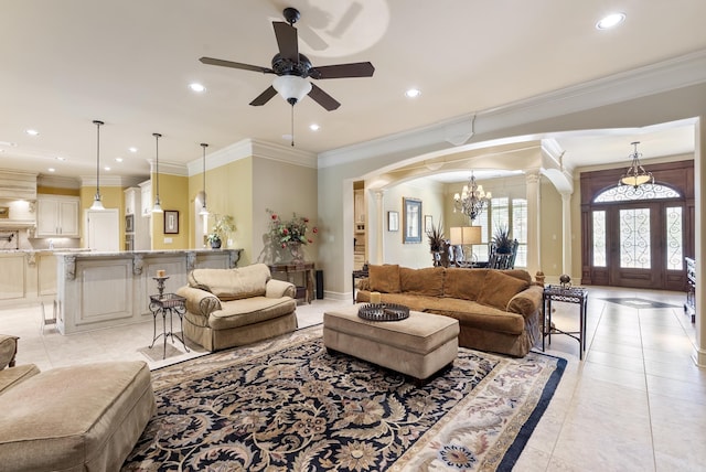 1606 Hilldale, Alexander, AR 72002 - living room featuring light tile patterned floors, recessed lighting, ornamental molding, arched walkways, and a ceiling fan