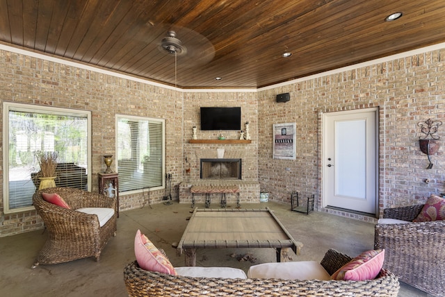 1606 Hilldale, Alexander, AR 72002 - living room with wood ceiling, brick wall, an outdoor brick fireplace, and crown molding