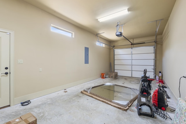 1606 Hilldale, Alexander, AR 72002 - garage featuring a garage door opener, electric panel, and baseboards