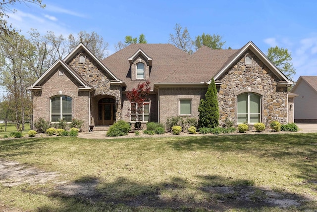 1606 Hilldale, Alexander, AR 72002 - view of front of home with a front yard, stone siding, and brick siding