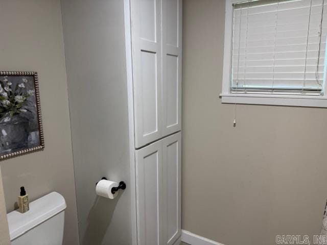 2012 Paula St, Pocahontas, AR 72455 - bathroom featuring toilet and baseboards