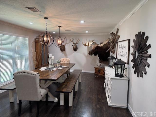 2012 Paula St, Pocahontas, AR 72455 - dining area featuring ornamental molding, a chandelier, dark wood-style flooring, recessed lighting, and baseboards
