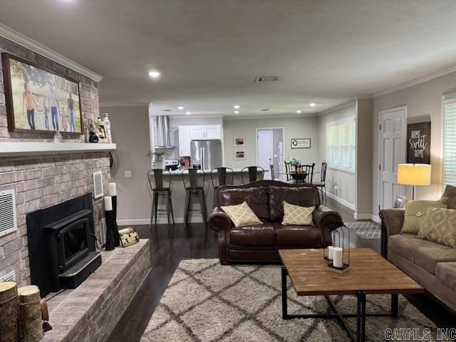 2012 Paula St, Pocahontas, AR 72455 - living room with ornamental molding, wood finished floors, baseboards, and recessed lighting