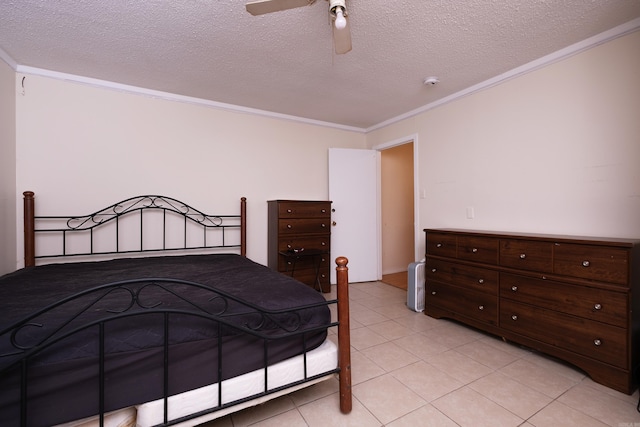 1411 Maple St, North Little Rock, AR 72114 - bedroom with ornamental molding, a textured ceiling, light tile patterned flooring, and ceiling fan