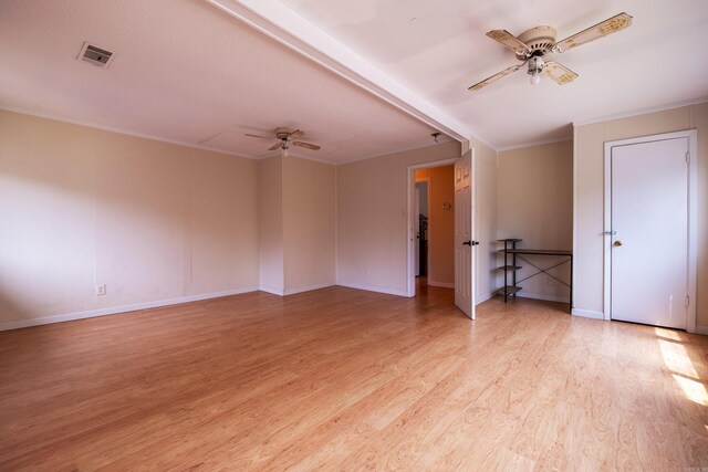 1411 Maple St, North Little Rock, AR 72114 - empty room featuring a ceiling fan, light wood-style flooring, ornamental molding, and baseboards