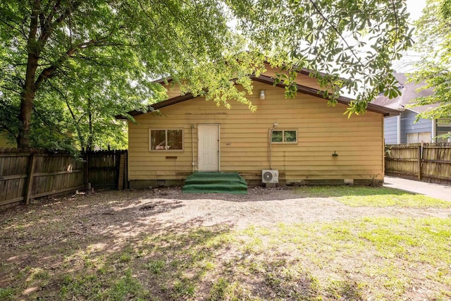 1411 Maple St, North Little Rock, AR 72114 - rear view of property featuring a fenced backyard and crawl space