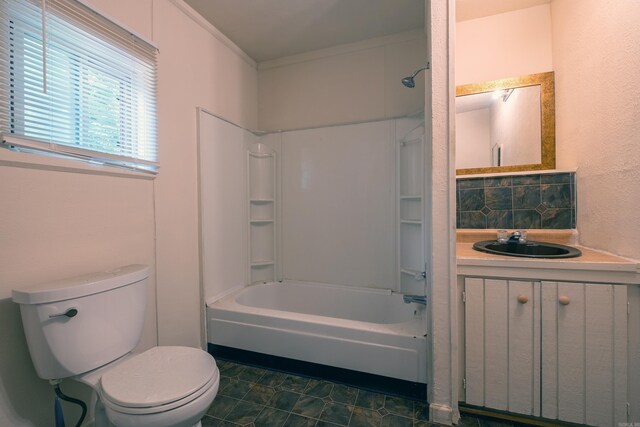 1411 Maple St, North Little Rock, AR 72114 - full bath with toilet, washtub / shower combination, vanity, tasteful backsplash, and crown molding
