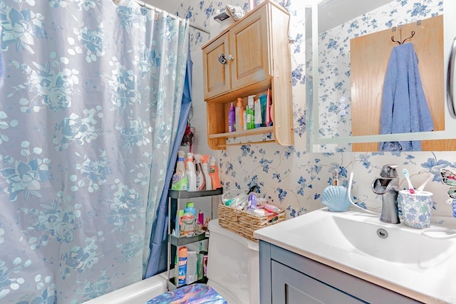 612 E E St, Russellville, AR 72801 - bathroom with vanity, backsplash, shower / bath combination with curtain, and toilet