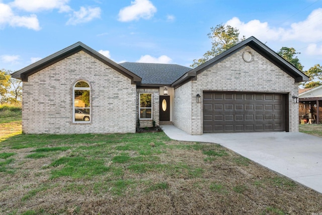 1415 Ben St, North Little Rock, AR 72117 - view of front facade with a garage, concrete driveway, a front lawn, brick siding, and roof with shingles
