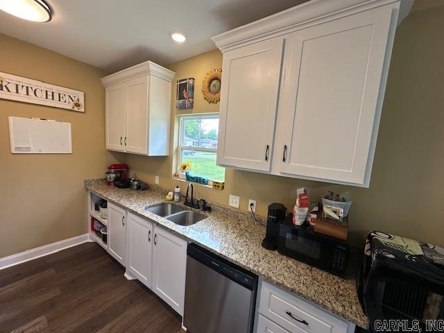 1415 Ben St, North Little Rock, AR 72117 - kitchen featuring dishwasher, a sink, black microwave, white cabinets, and dark wood finished floors