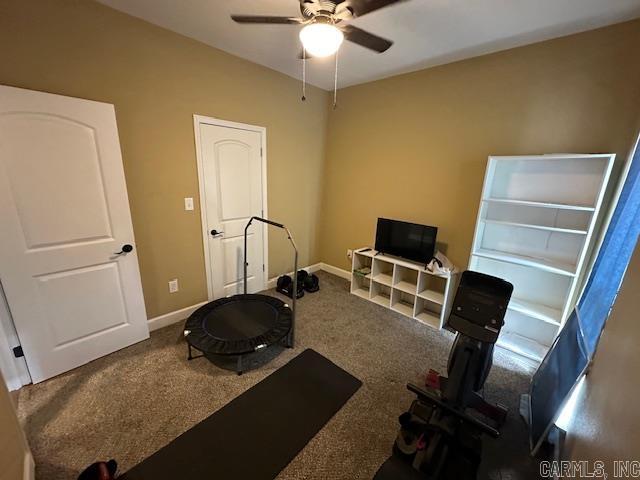 1415 Ben St, North Little Rock, AR 72117 - exercise room featuring ceiling fan, carpet, and baseboards