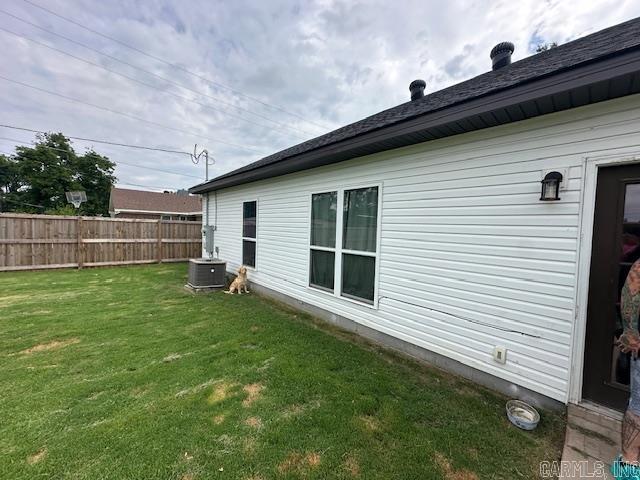 1415 Ben St, North Little Rock, AR 72117 - view of side of home with central AC