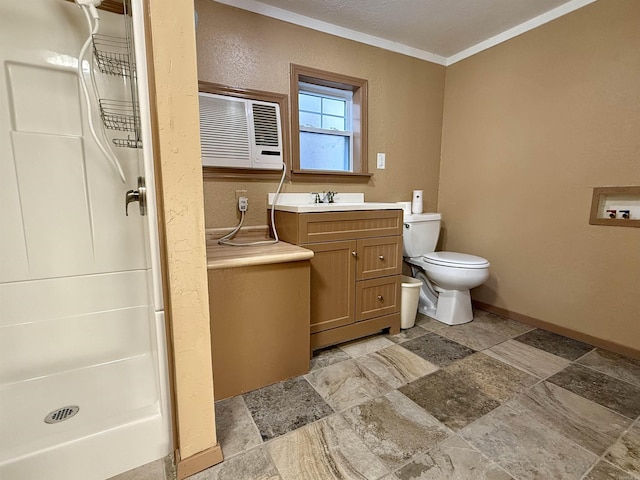 full bathroom featuring ornamental molding, vanity, toilet, a shower stall, and stone finish flooring