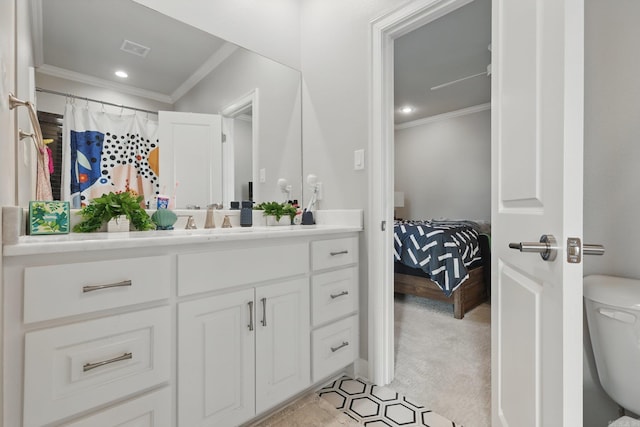 7429 Lake Point Cir, Benton, AR 72019 - bathroom with crown molding, vanity, toilet, recessed lighting, and tile patterned flooring