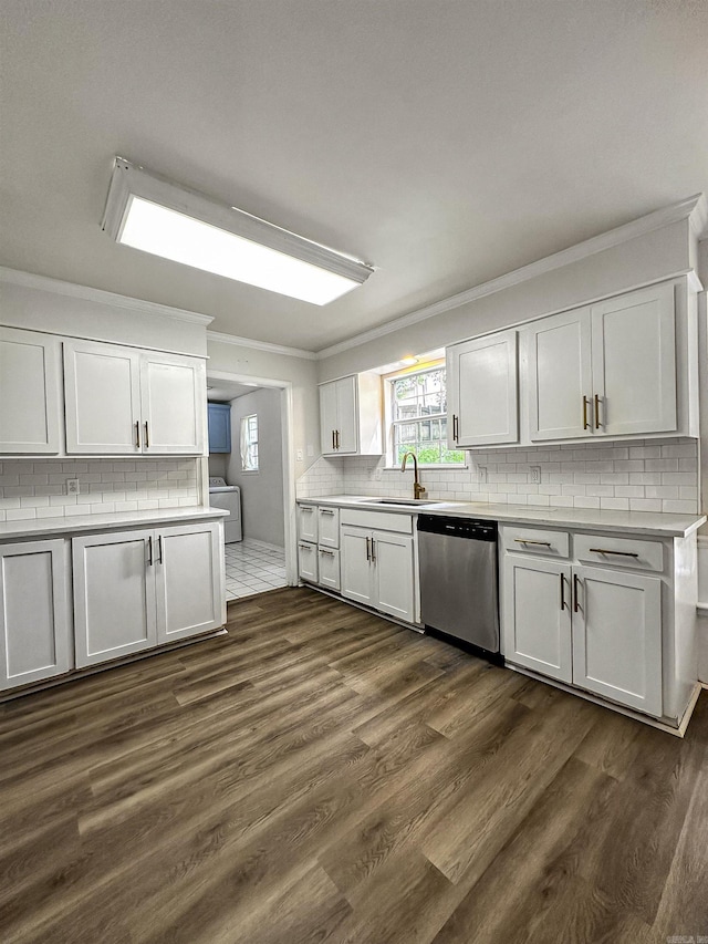 23 Morrison Ct, Little Rock, AR 72212 - kitchen featuring dishwasher, backsplash, a sink, white cabinets, and crown molding