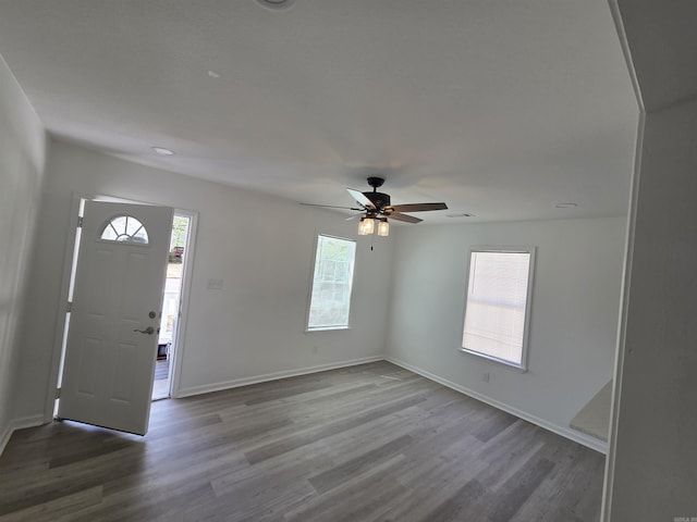 4518 W 25th, Little Rock, AR 72204 - entrance foyer with wood finished floors, ceiling fan, and baseboards