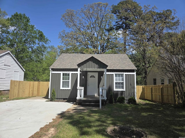 4518 W 25th, Little Rock, AR 72204 - bungalow featuring board and batten siding and a shingled roof