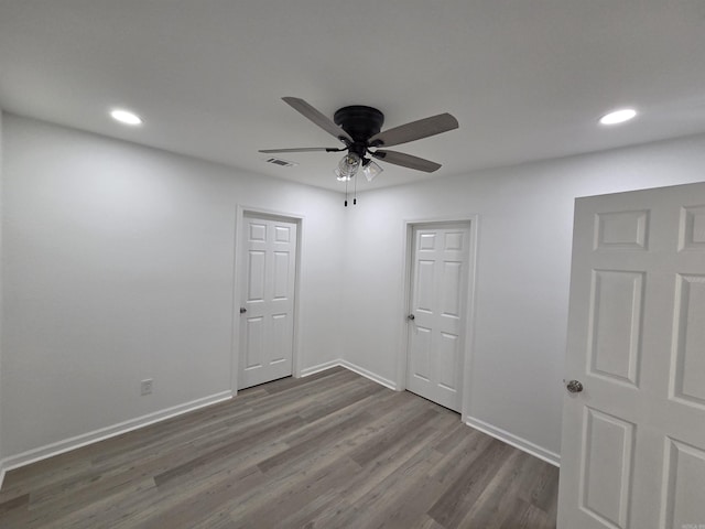 4518 W 25th, Little Rock, AR 72204 - unfurnished room featuring ceiling fan, recessed lighting, dark wood-style floors, and baseboards