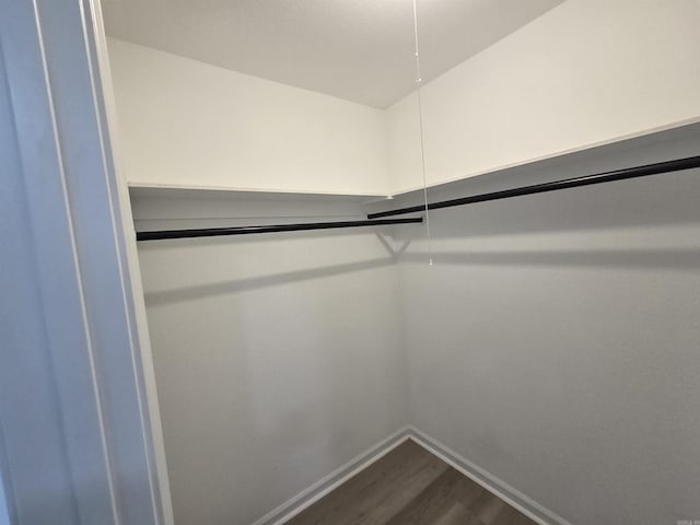 4518 W 25th, Little Rock, AR 72204 - spacious closet featuring dark wood finished floors