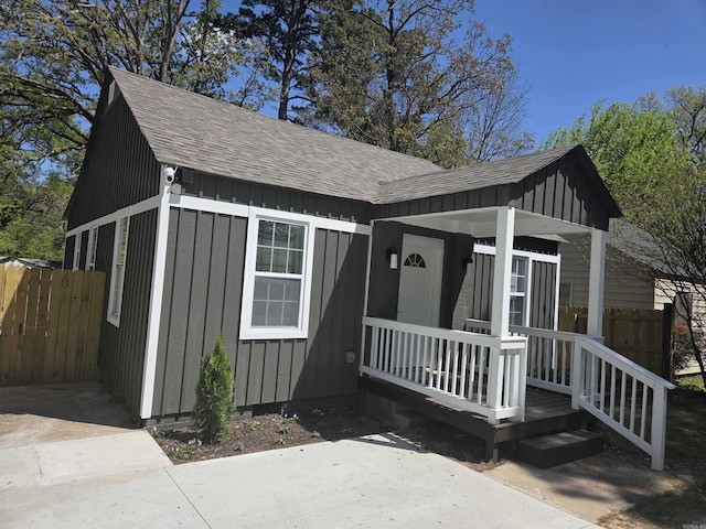 4518 W 25th, Little Rock, AR 72204 - view of front of house with a shingled roof, board and batten siding, and covered porch