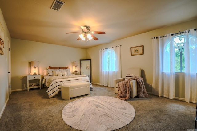 2318 Breckenridge Dr, Little Rock, AR 72227 - carpeted bedroom with ceiling fan and baseboards