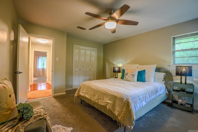 2318 Breckenridge Dr, Little Rock, AR 72227 - bedroom with carpet floors, multiple windows, a closet, and ceiling fan