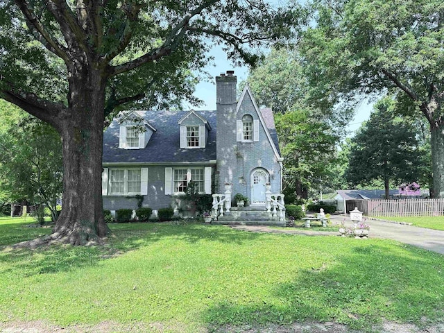 582 N Fourth Ave, Piggott, AR 72454 - view of front of property with a chimney