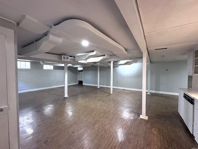 582 N Fourth Ave, Piggott, AR 72454 - below grade area featuring wood finished floors and baseboards