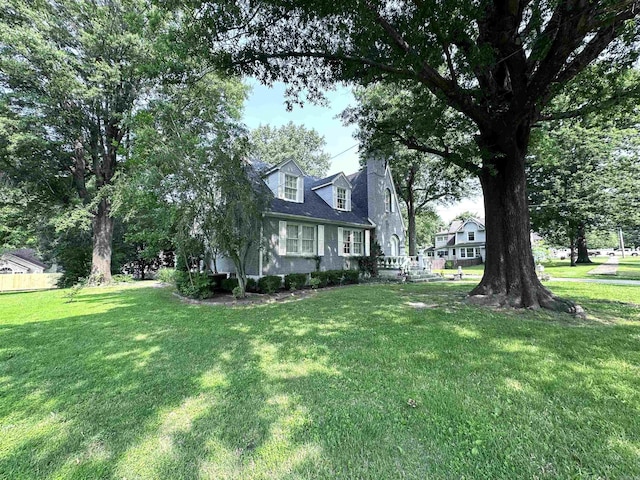 582 N Fourth Ave, Piggott, AR 72454 - view of front of house featuring a front yard