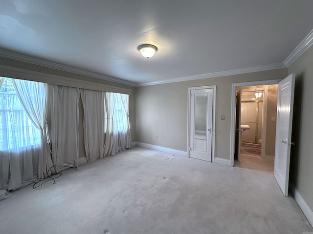 582 N Fourth Ave, Piggott, AR 72454 - unfurnished bedroom featuring ornamental molding, light colored carpet, and baseboards