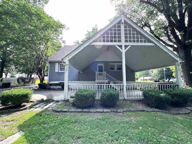 582 N Fourth Ave, Piggott, AR 72454 - view of front of house with stairway