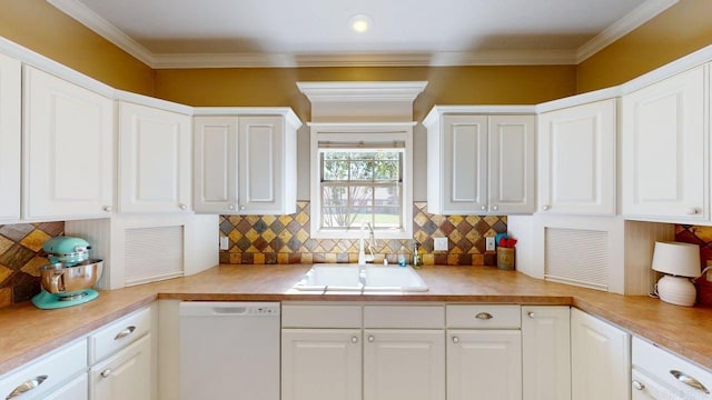 3805 Irby Dr, Conway, AR 72034 - kitchen featuring white dishwasher, a sink, white cabinetry, light countertops, and crown molding